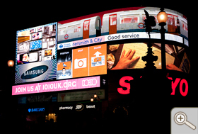 Still from Lights at Piccadilly Circus with 10:10 graphics